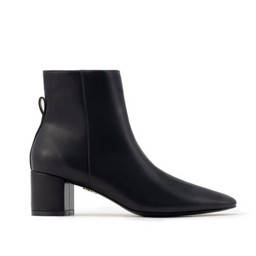 Black vegan leather ankle boot with block heel – sleek and modern women's vegan footwear for versatile styling and all-day comfort.