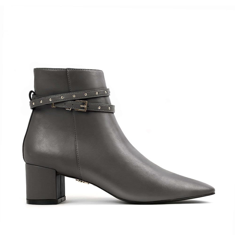 Grey vegan leather ankle boot with block heel and studded ankle straps – sleek and modern women's vegan footwear for versatile styling and all-day comfort.